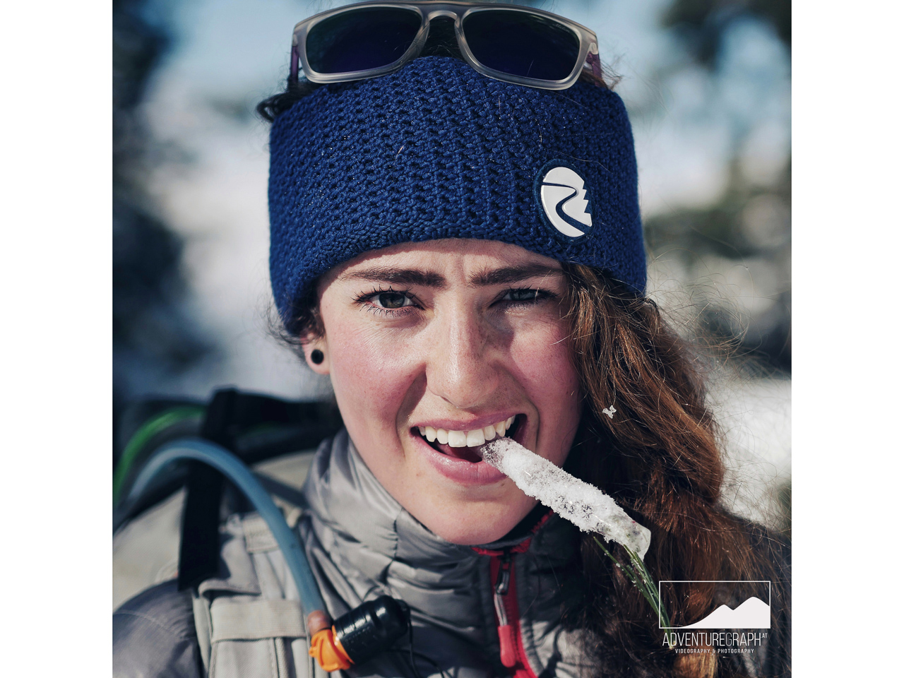 Adventourus outdoor girl doing ski tour in the nature of Tirol.