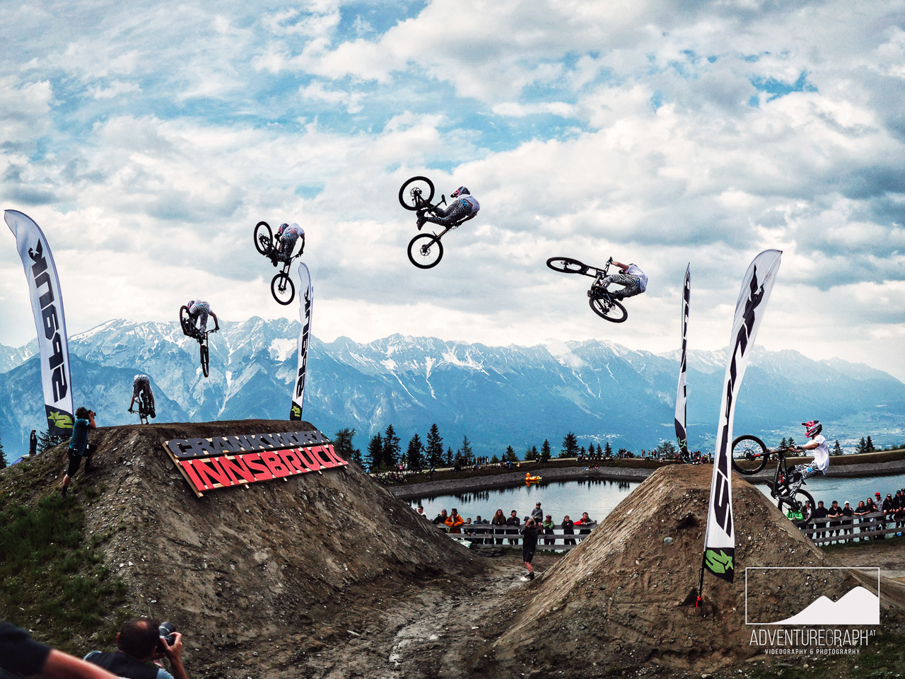 Huge jump (whip) on downhill bike at Crankworx Innsbruck event by Kaos Seagrave.