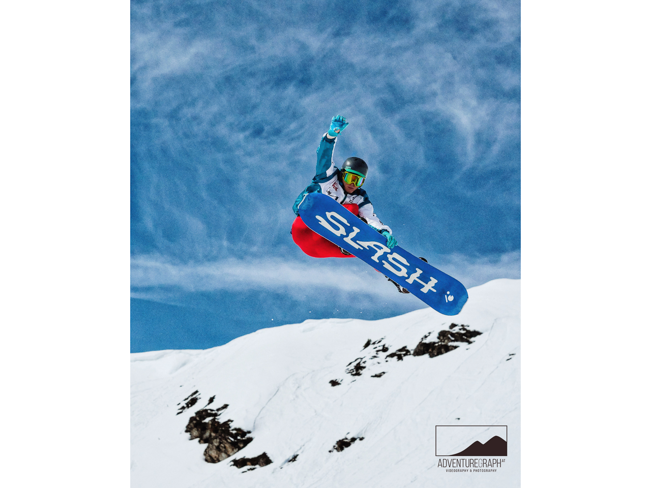 Stylish snowboard grab at event near Innsbruck.
